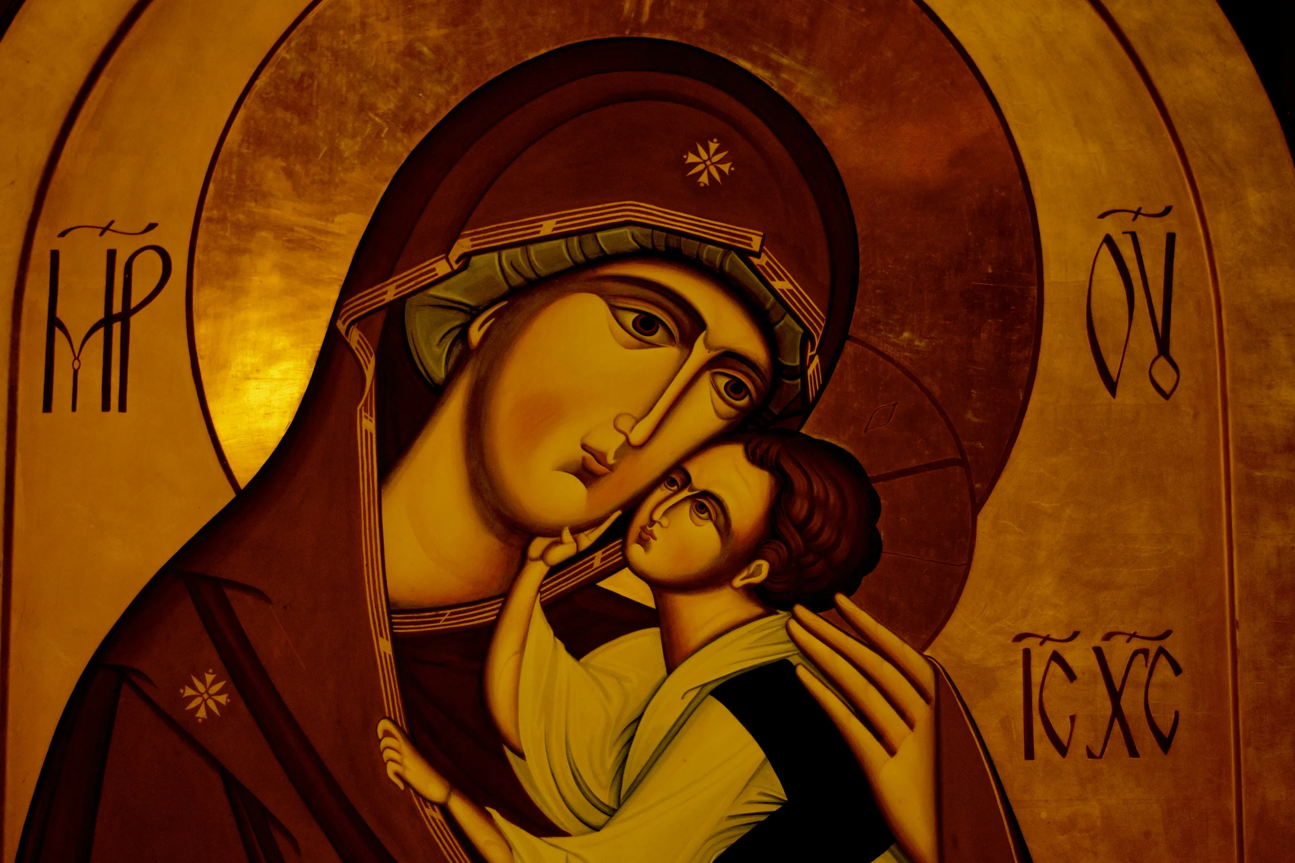 Byzantine icon of the Theotokos, the Christ child resting against her cheek
